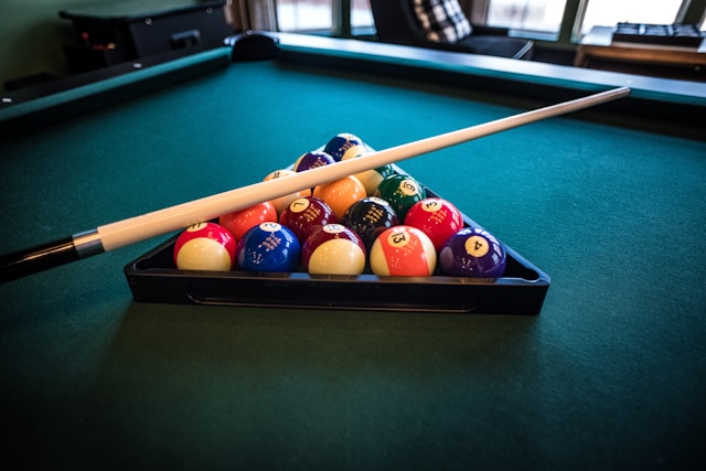 Pool table with billiard balls